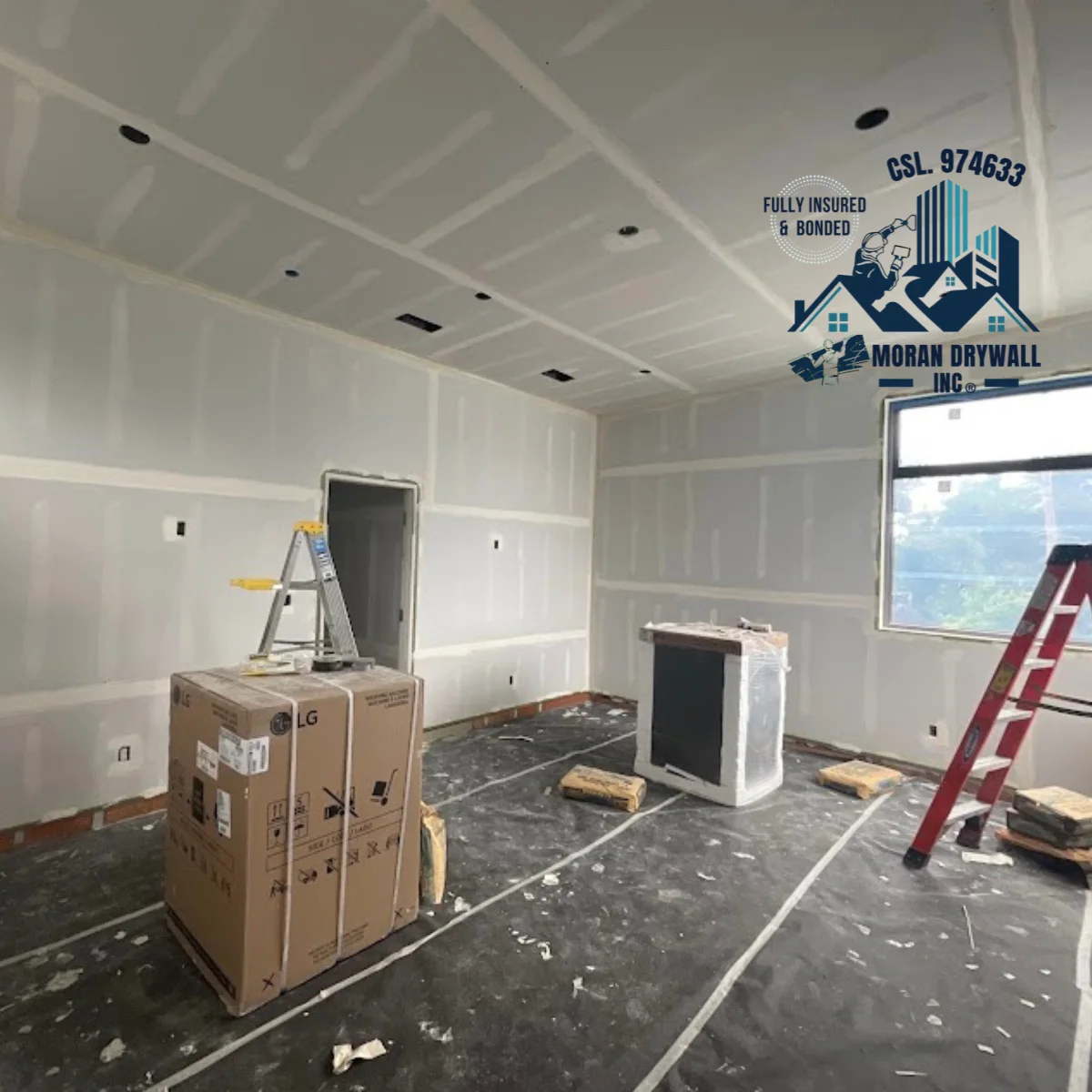 Drywall installation in progress