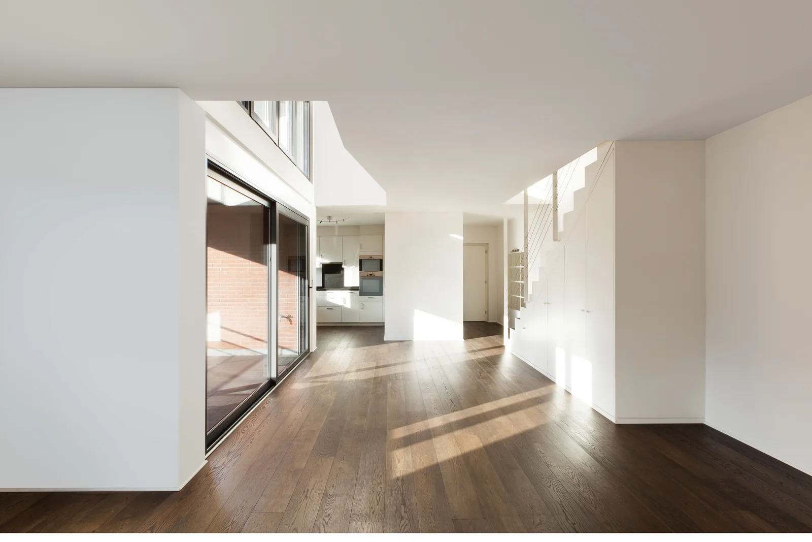 Finished bright interior with smooth walls and hardwood floors