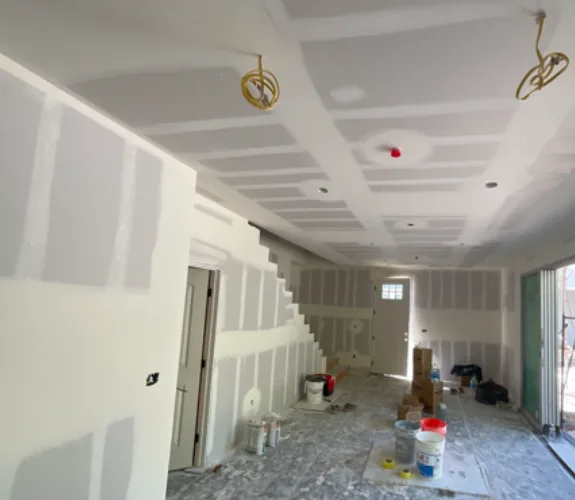 Drywall work in progress in a commercial interior